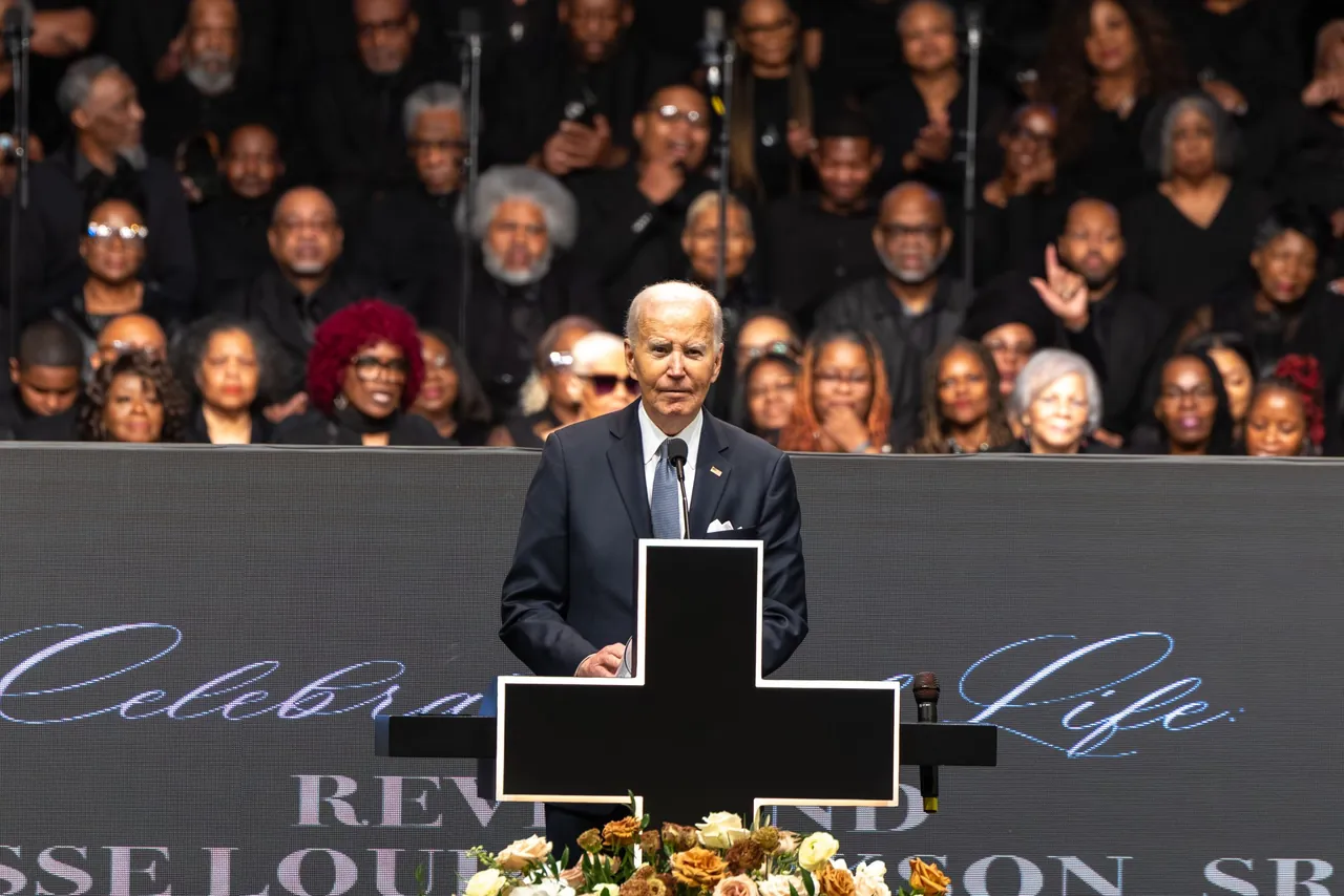 Joe Biden speaks at the lectern in front of the choir