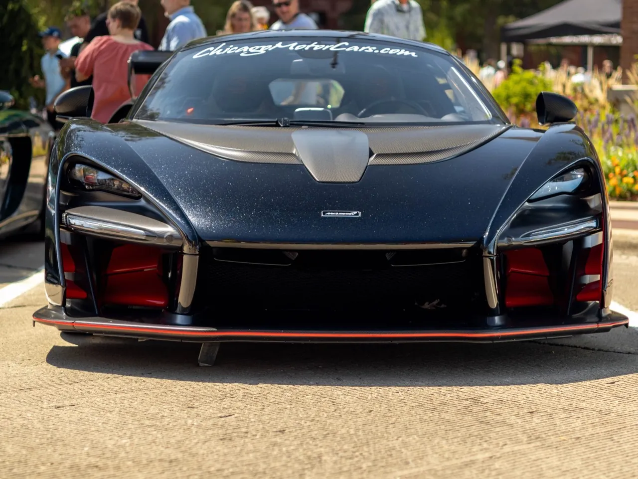 A McLaren Senna nose-on at a car meet